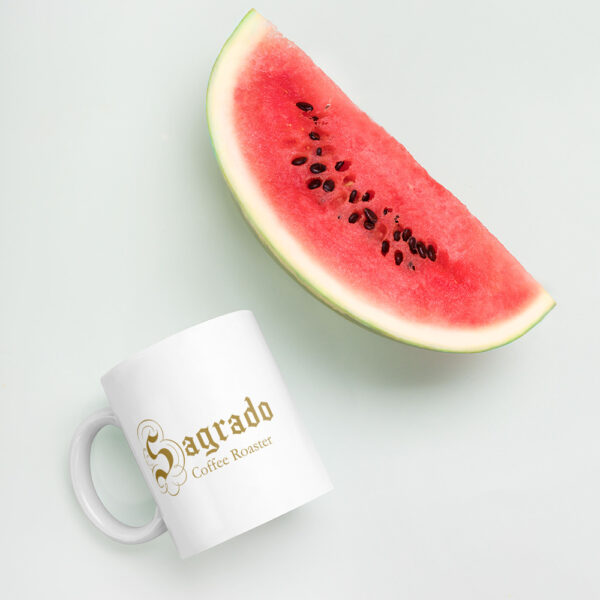 Sagrado Coffee 110z mug next to a slice of watermelon 2